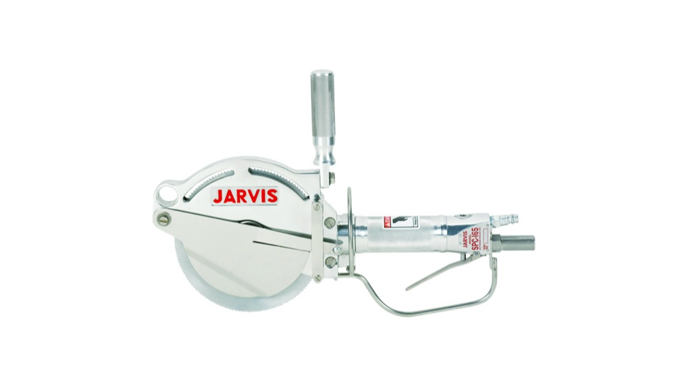 Pneumatic saw being used on a meat processing production line